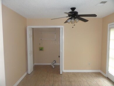 BREAKFAST AREA/ LAUNDRY ROOM