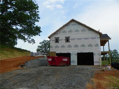 Driveway to garage and to back deck