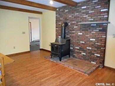 Kitchen Dining. Cozy wood stove in  the spacious k
