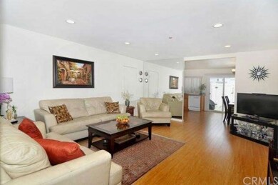 Enjoy recessed lighting, wood-flooring and a spaci