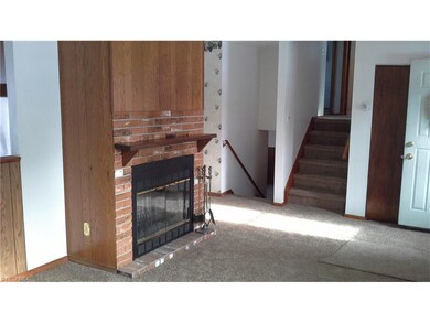 Welcoming fireplace on the main level to warm thos