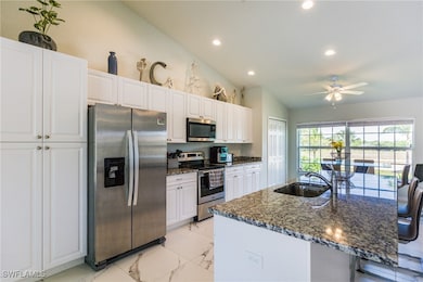 Kitchen featuring stainless steel appliances, sink