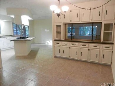 Dining Room opens to Kitchen--Tile Floors flow thr