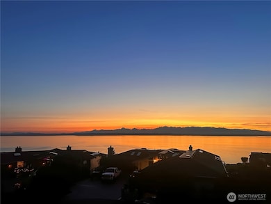Sweeping Sound & Mountain views from both levels.