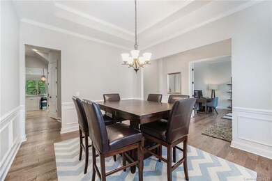 Front formal dining room has upgraded crown moulding and picture moulding.