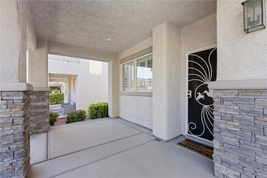 Entrance to property featuring stucco siding
