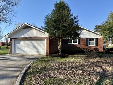 Attached 2-car garage and ample parking spaces.