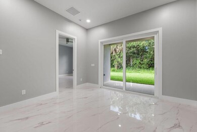 660 NE Moss Rose Place, Port St. Lucie, FL 34983 - photo 6