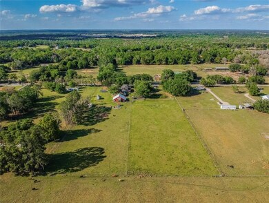 Rear aerial view of all 4.81 acres