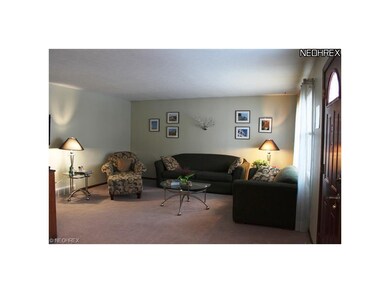Living Room with neutral carpet