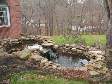 Yard/Garden. Front Waterfall and Pond
