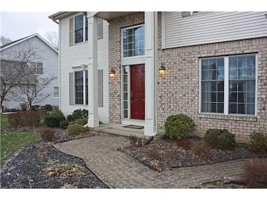 Exterior Front. The welcoming front door is surrou