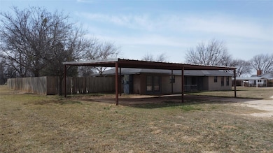 View of outdoor structure with fence