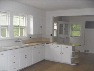 A great farm house kitchen that takes you back in time. This kitchen has a breakfast area with built in china cabinet.