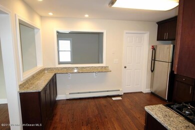 Granite Breakfast Bar looking into den