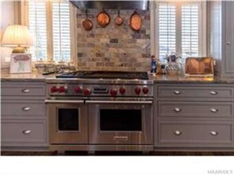 EXTRA DEEP COUNTERTOPS, TUMBLED MARBLE BACKSPLASH 