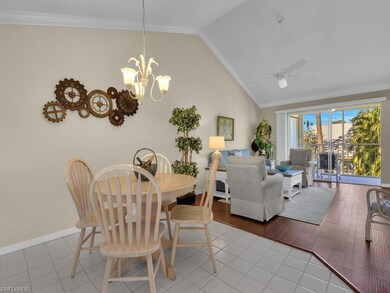 Dining area featuring vaulted ceiling, a ceiling f