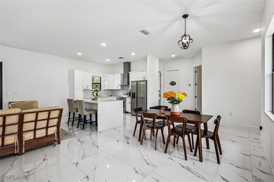 Dining room featuring recessed lighting, visible v