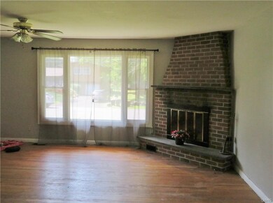 Living Room and Fireplace - HW floors