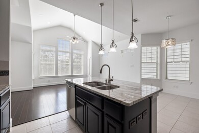 Experience a kitchen with an amazing island as its
