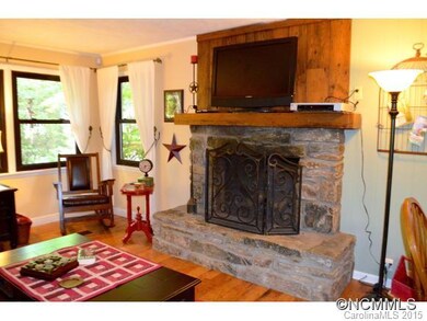 Stone fireplace & open windows