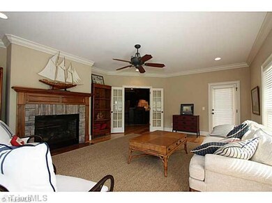 Living Room. Bright Living Room with two-sided fireplace