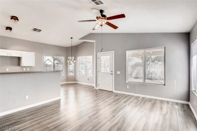 Connected family room, dining room and kitchen is