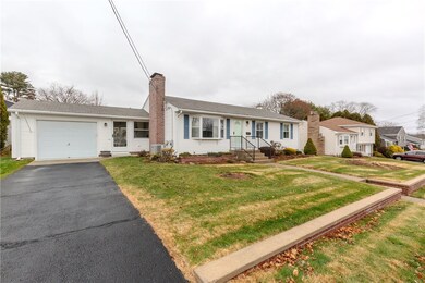 Front yard, driveway and garage