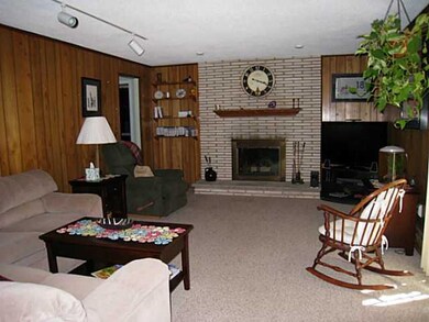 Family Room. Woodburning Fireplace. Sliding glass 