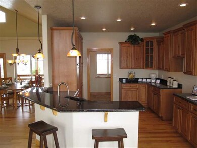 Beautiful kitchen with red oak floors, hickory cab