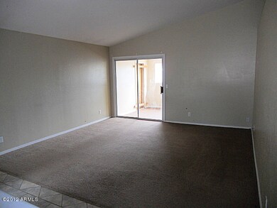 living room and door to Arizona room