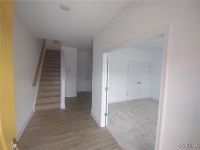 Hallway featuring light wood-type flooring