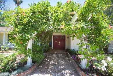 Trumpet vine and Wisteria entry