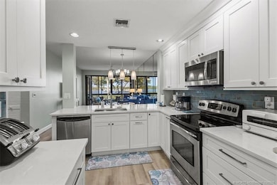 Kitchen which overlooks the living / dining room.