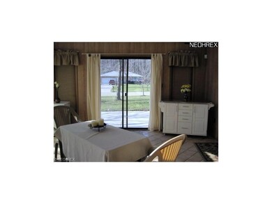 Sun room off family room brings the outside in all year round!