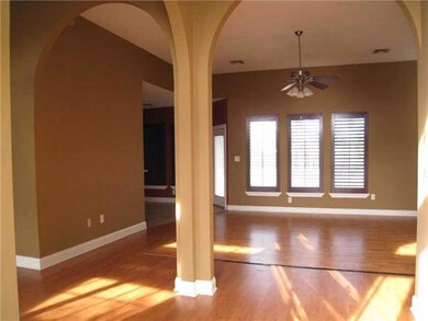 Image. ARCHES FLANK THE CORNERS OF  FOYER, FORMAL