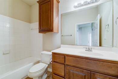 Bathroom featuring vanity and shower / bathtub co