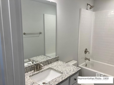 Bathroom with bathtub / shower combination and vanity