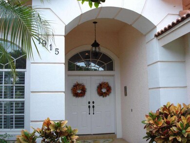 Arched entryway w/ double doors