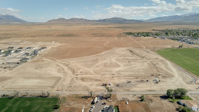 Aerial overview of property's location featuring rural landscape and a desert landscape