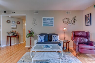 Living room featuring hardwood / wood-style floors
