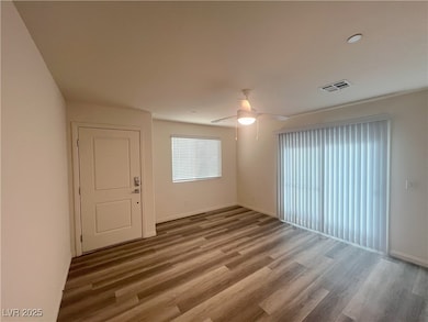 Unfurnished room featuring wood finished floors an