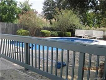 Wood fence repaired and painted