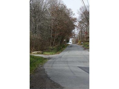 Exterior Front. View of road. Many acreage propert