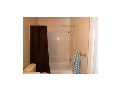 Full bath hallway.
