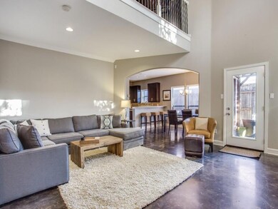 View into the gorgeous kitchen and fenced in yard 