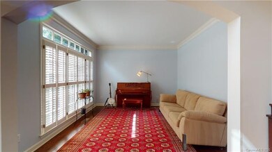 Formal living room makes a great music room or hom
