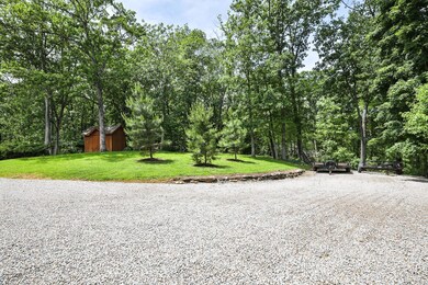 Additional parking pads and utility shed.