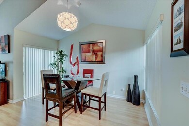 Dining room with vaulted ceilings