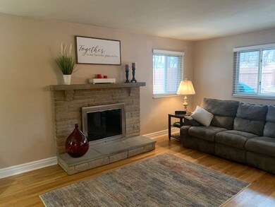 THE LIVING ROOM IS A GENEROUS 19X14 AND IS HIGHLIG